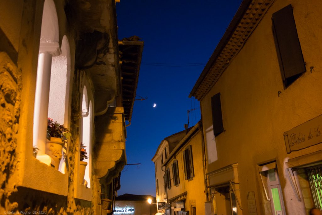 Street in the evening with moon