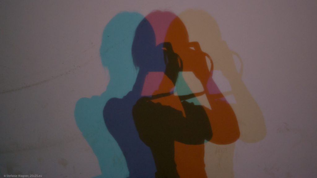 Shadow through a prism showing different colors