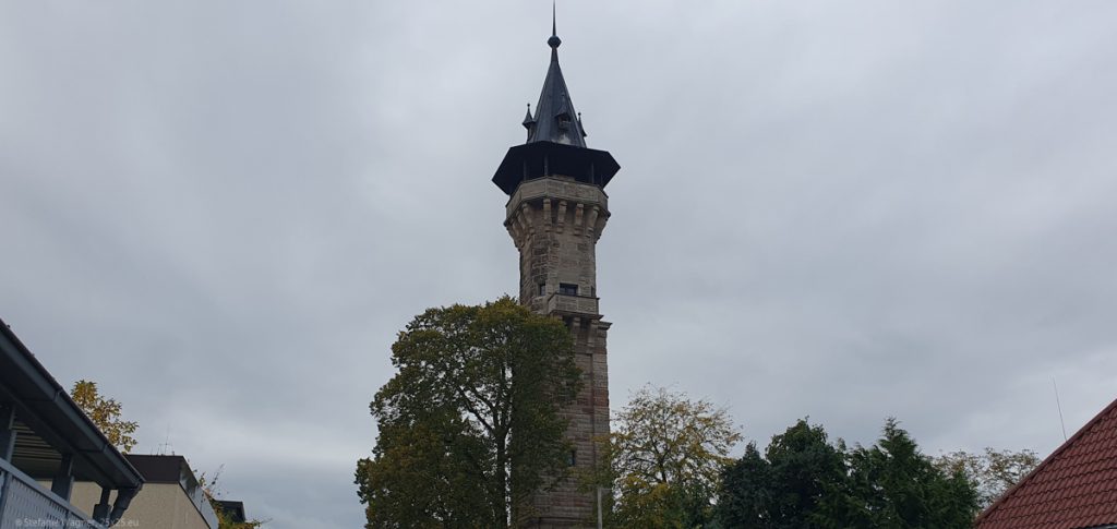 Lean tower with a pointed, high roof