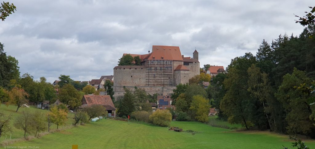 View towards the castle with a meadow in front